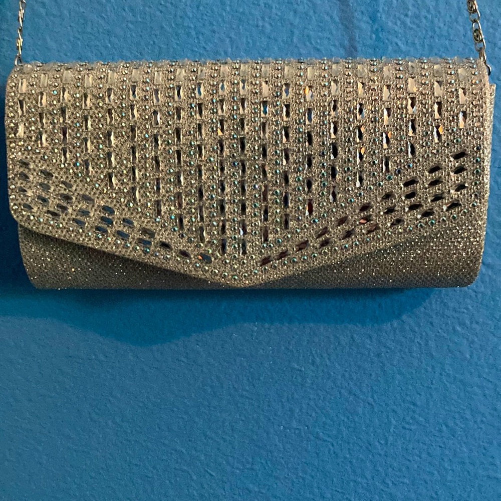 Selling a smaller clutch/ purse.